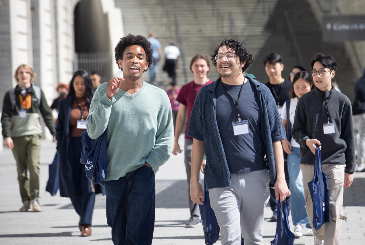 Students walking toward the camera